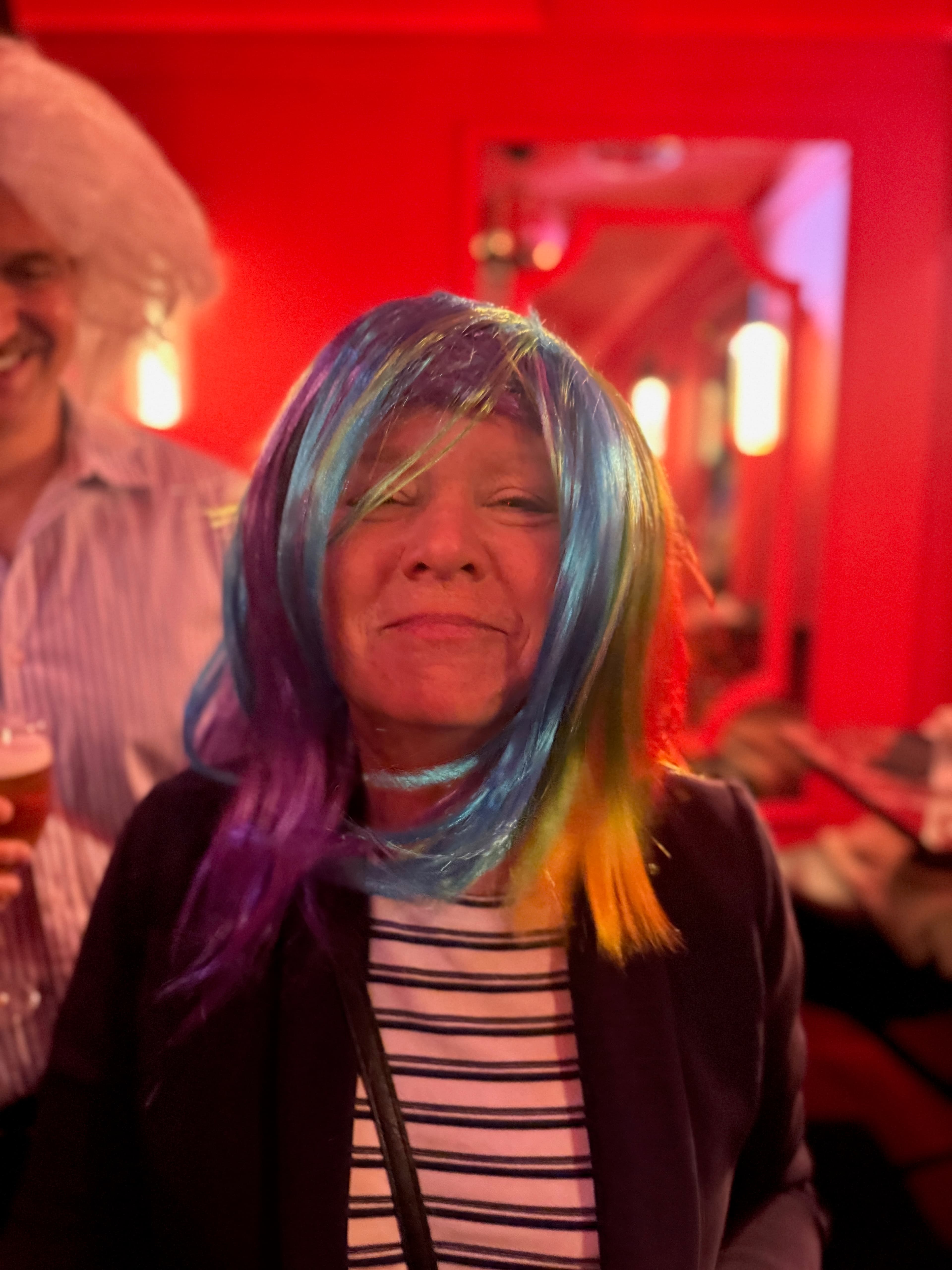 Night-out wig portrait with playful expression and party atmosphere