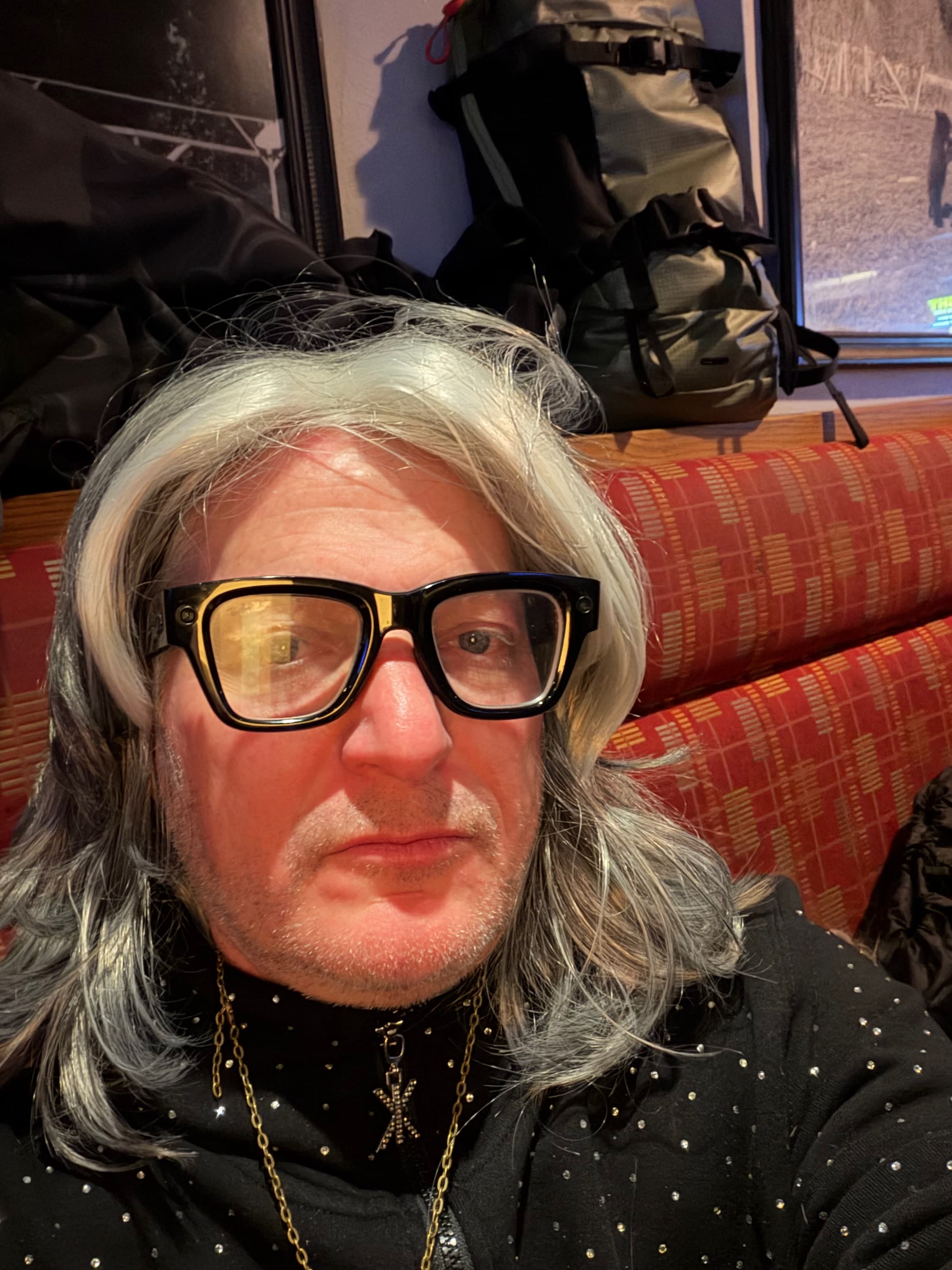 Party group in wigs singing karaoke